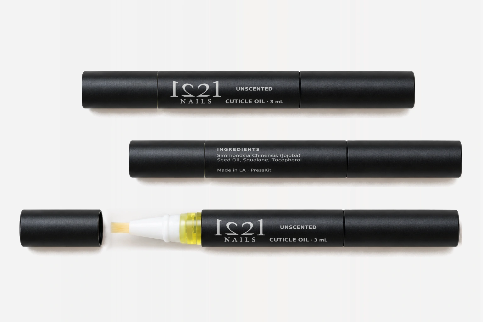 Unscented cuticle oil 3mL, stacked front, back and uncapped pens