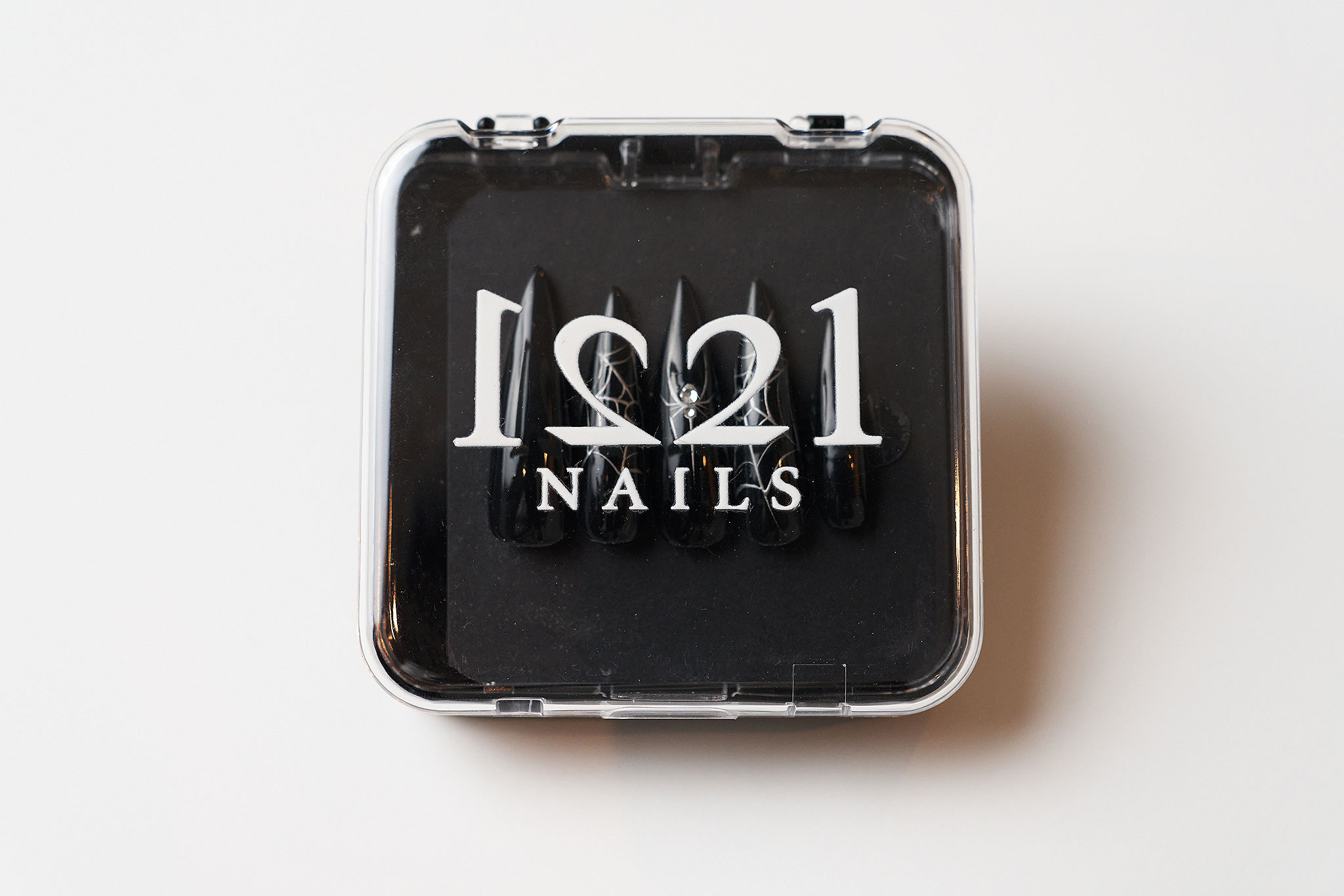Midnight Web nails in their case
