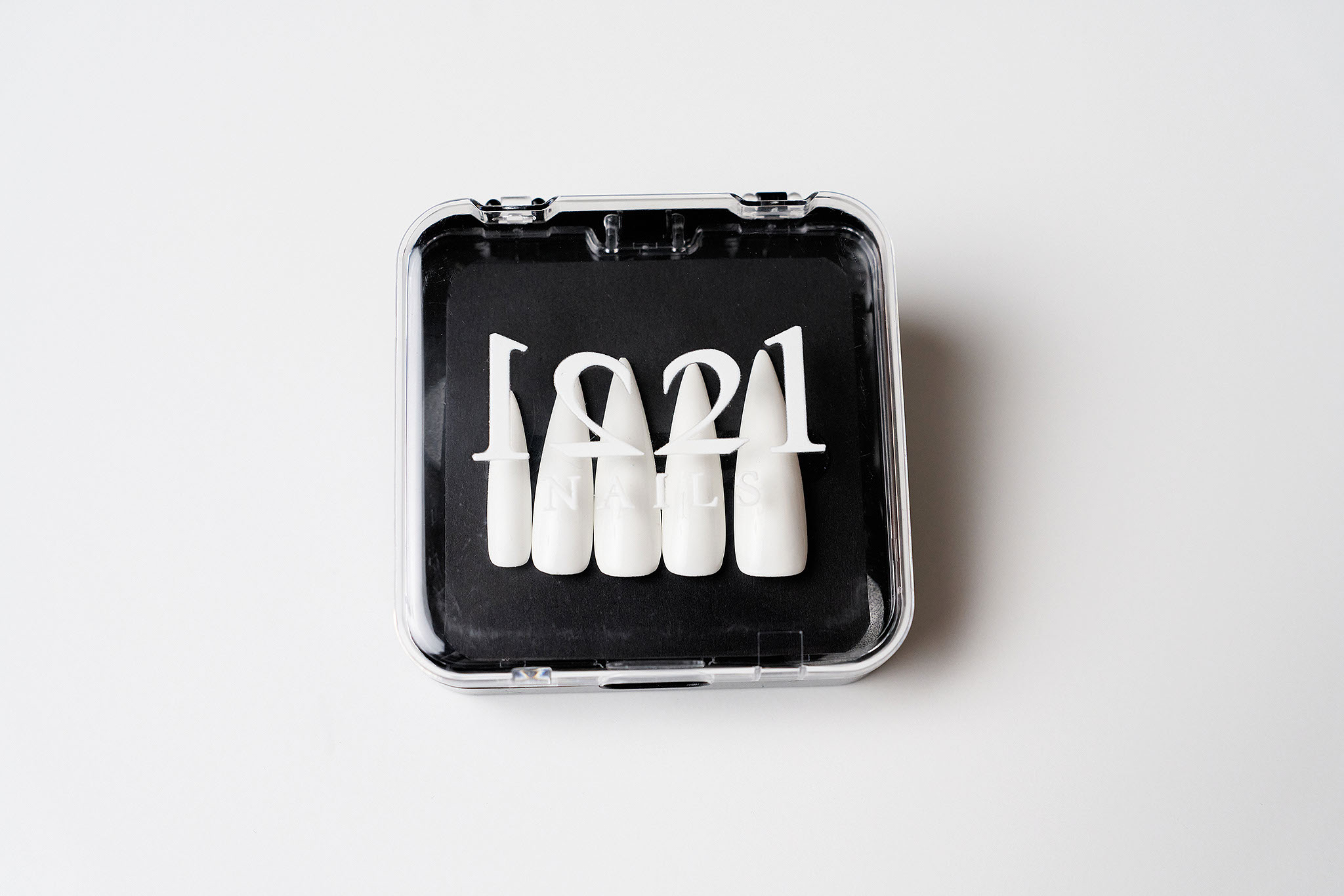 Signature White nails in their case